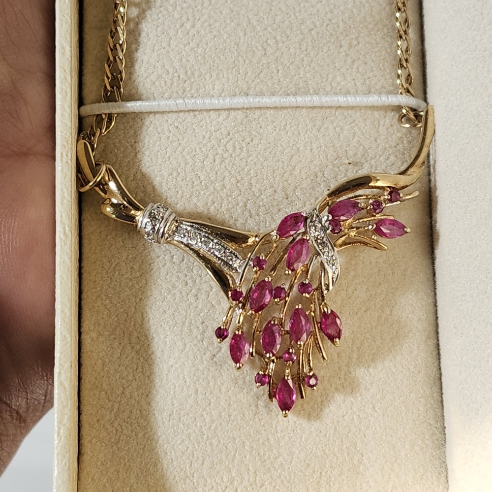 Beautiful Vintage real ruby and diamond necklace in brand new condition.